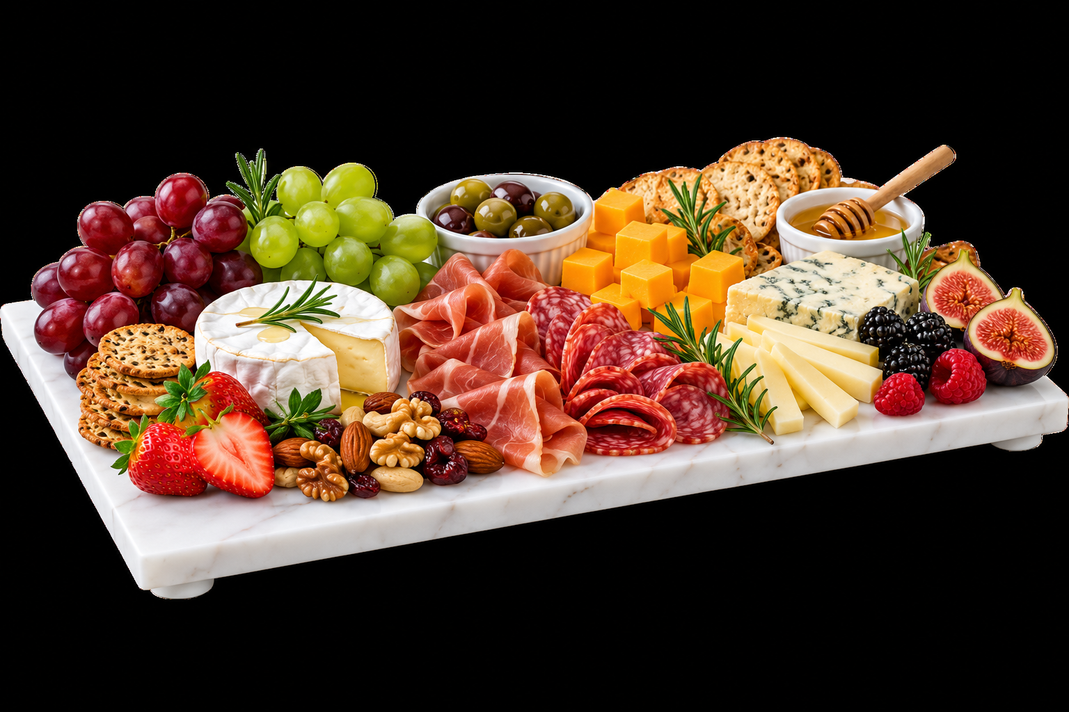 Marble charcuterie board with cheeses, cured meats, fruit, crackers, and honey